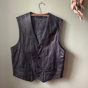Genuine black leather vest. Great condition. Cotton lining.